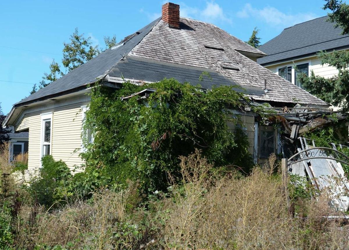 The City of Bellingham will spend up to $150,000 to tear down two houses on Lynn Street: 2512, pictured here, Wednesday, Sept. 13, 2017, and 2315. Both have been deemed a public nuisance and a threat to public health.