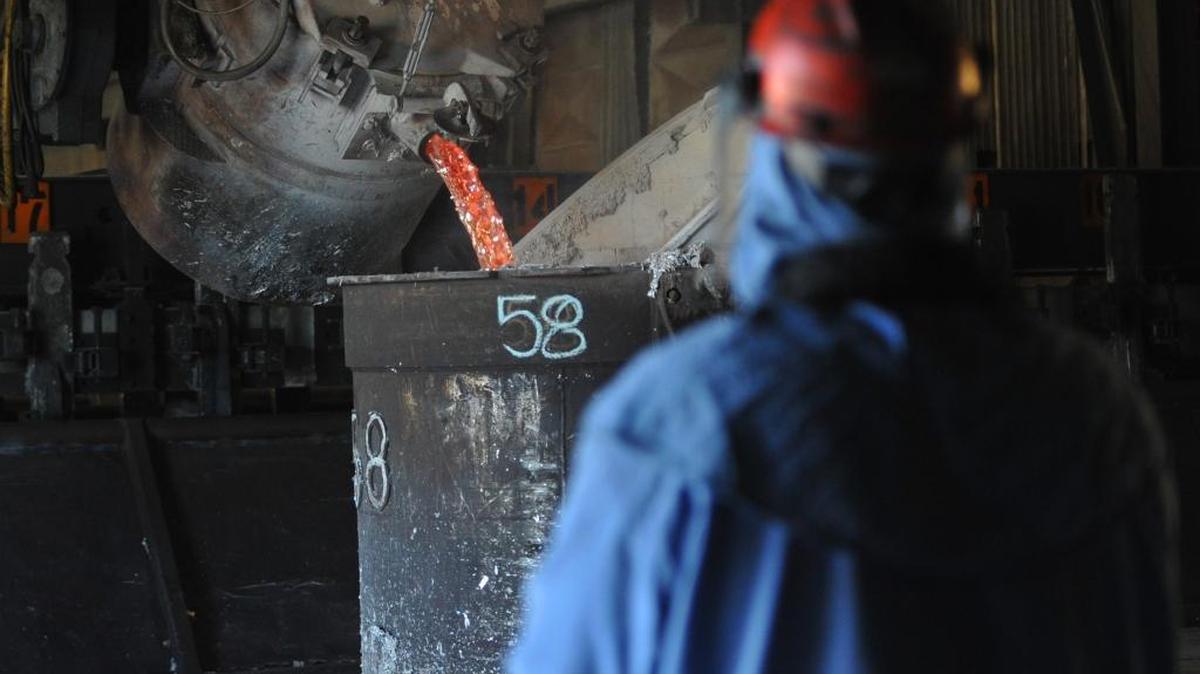 Don Larson pours molten aluminum using remote controls at Alcoa Intalco Works west of Ferndale on July 14, 2010. The U.S. Department of Labor has approved federal assistance for any workers at the smelter who are laid off if its operations are curtailed in 2016 as expected.