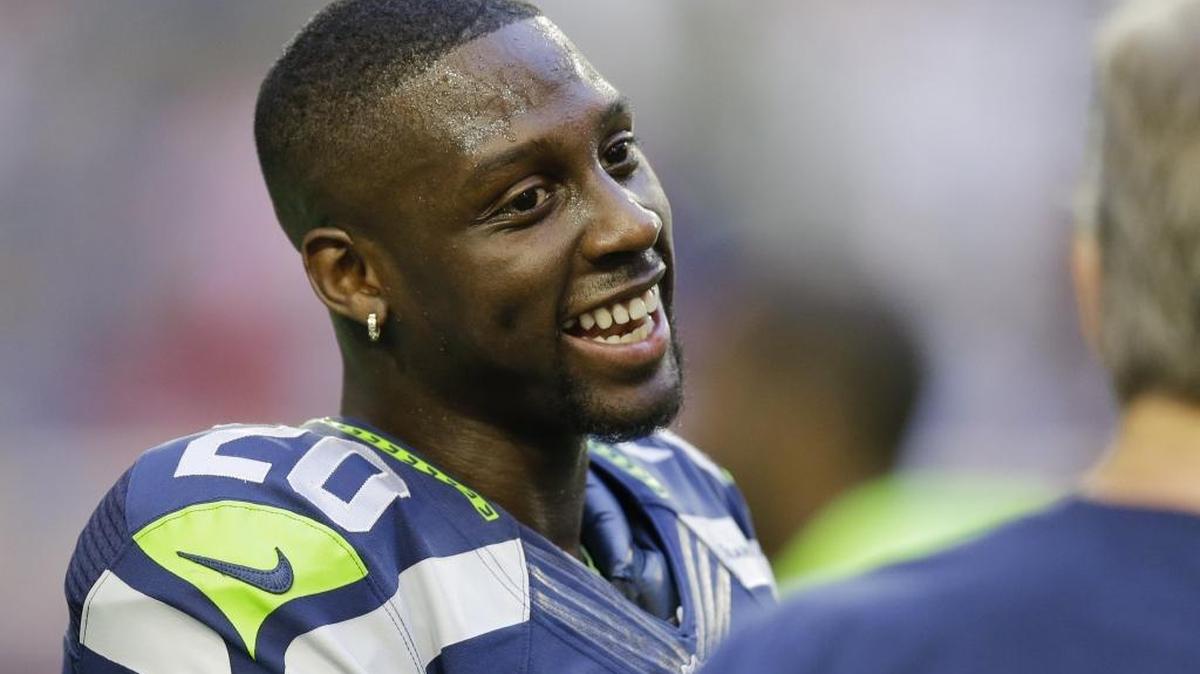 Seattle Seahawks cornerback Jeremy Lane talks to a coach before the NFL Super Bowl XLIX football game against the New England Patriots Feb. 1, 2015, in Glendale, Ariz. Lane will participate in a charity bowling event on Saturday, June 25, 2016 at Mt. Baker Lanes in Ferndale.