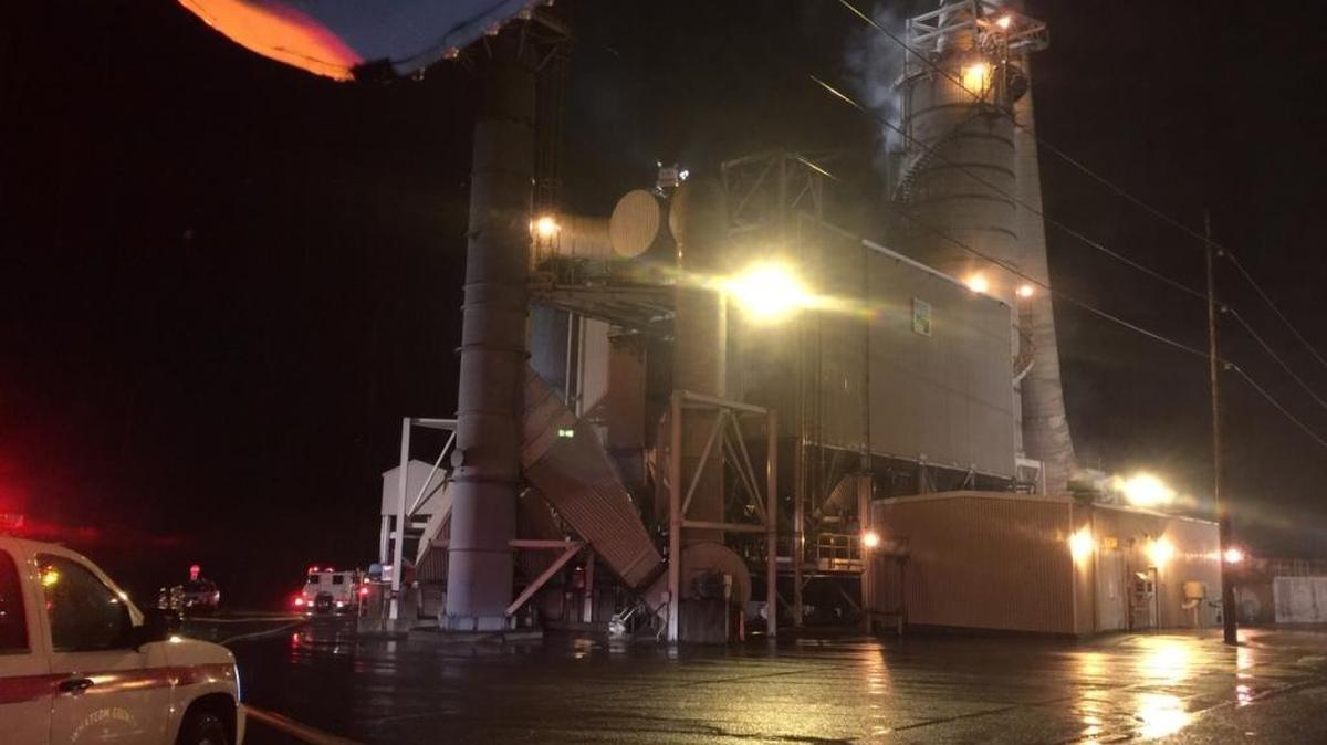 Smoke billows from a tower that’s part of an emission-control system connected to the carbon plant at Alcoa Intalco Works west of Ferndale early Tuesday, Nov. 15, 2016.