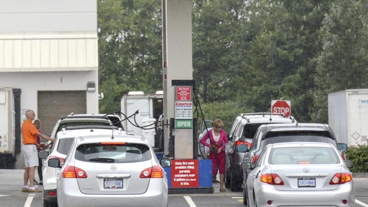 Costco members fill up at a gas station in Bellingham on July 24, 2015.