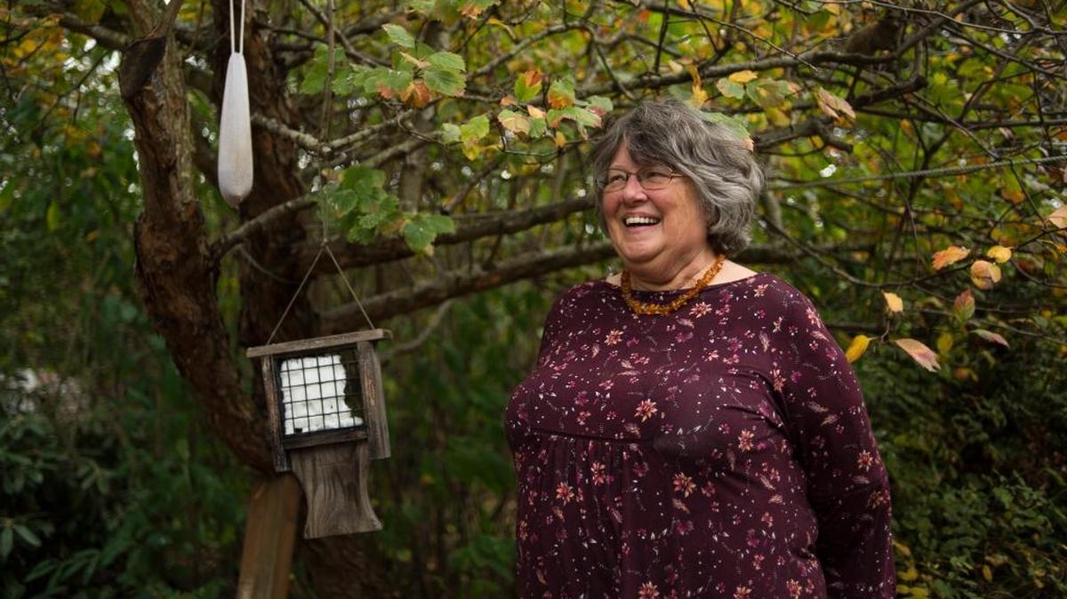 Ronalee Kincaid is pictured in her yard on Friday, Oct. 6, in Bellingham. Kincaid's yard is a certified backyard wildlife sanctuary.