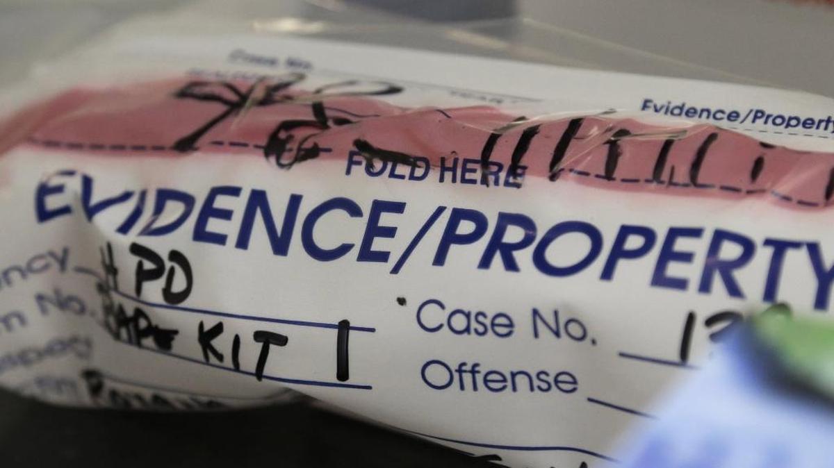 This April 2, 2015, photo shows an evidence bag from a sexual assault case in the biology lab at the Houston Forensic Science Center in Houston. The Washington State Patrol Crime Lab, which processes the kits for agencies across the state, says it isn’t making a dent in the backlog of kits needing testing.