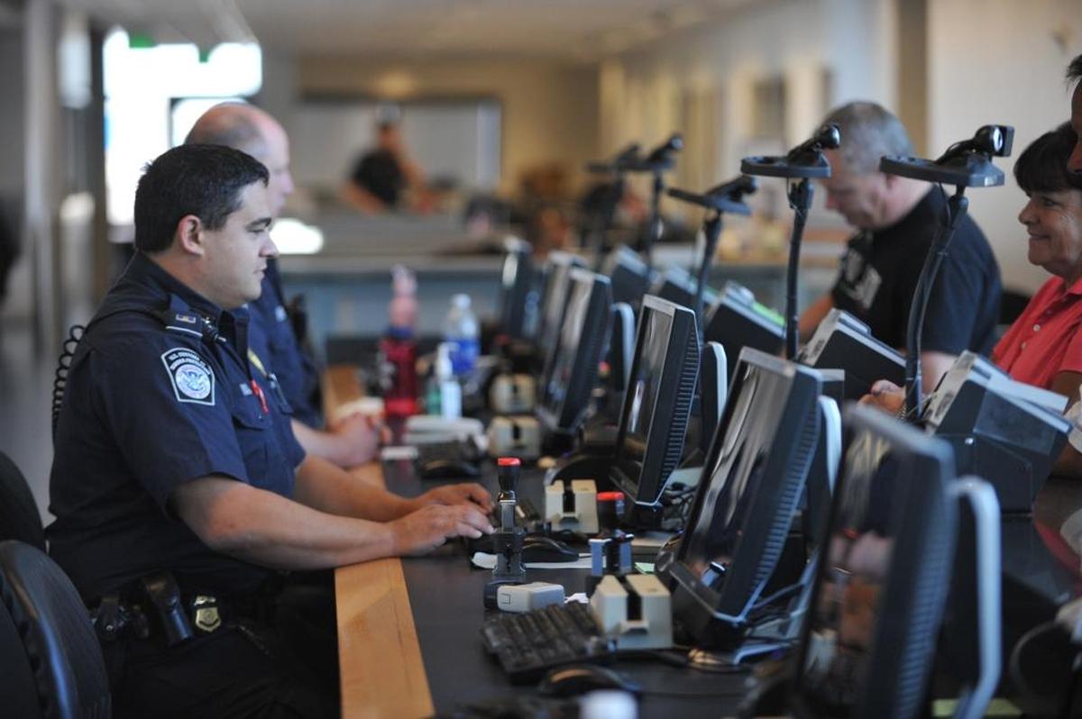 U.S. Customs and Border Protection agents interviews travelers at the Peace Arch Port of Entry building. If someone declares their intention to seek asylum at a legal port of entry, Canadian immigration officials are required to turn them family back. But the agreement between U.S. and Canada does not affect those crossing illegally.