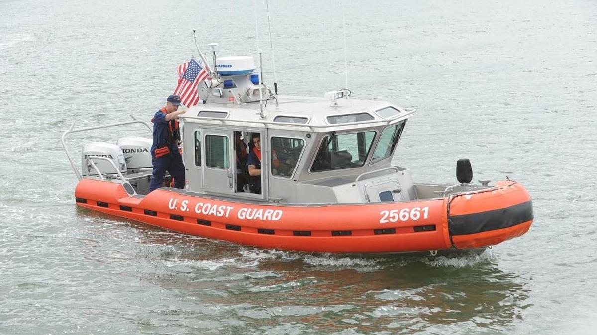 The U.S. Coast Guard and the U.S. Coast Guard Auxiliary participate in a Search and Rescue and vessel towing drill in Bellingham Bay, June 12, 2013. The Coast Guard is beginning to enforce the new federal standard for Hull Identification Numbers.