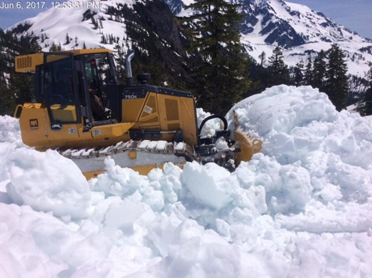 More than 40 feet of snow still sit on top of some areas of Mount Baker Highway as Washington State Department of Transportation crews start plowing the last 2.7 miles of the road up to Artist Point, a jumping-off spot for stunning mountain hikes. This photo shows crews working on Tuesday, June 6.