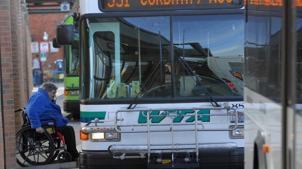 Helen Saunders uses the wheelchair ramp to get on a bus at the Whatcom Transportation Authority’s Bellingham station on Feb. 17, 2009. WTA has proposed several changes to the bus schedule that if passed would start in March 2017.