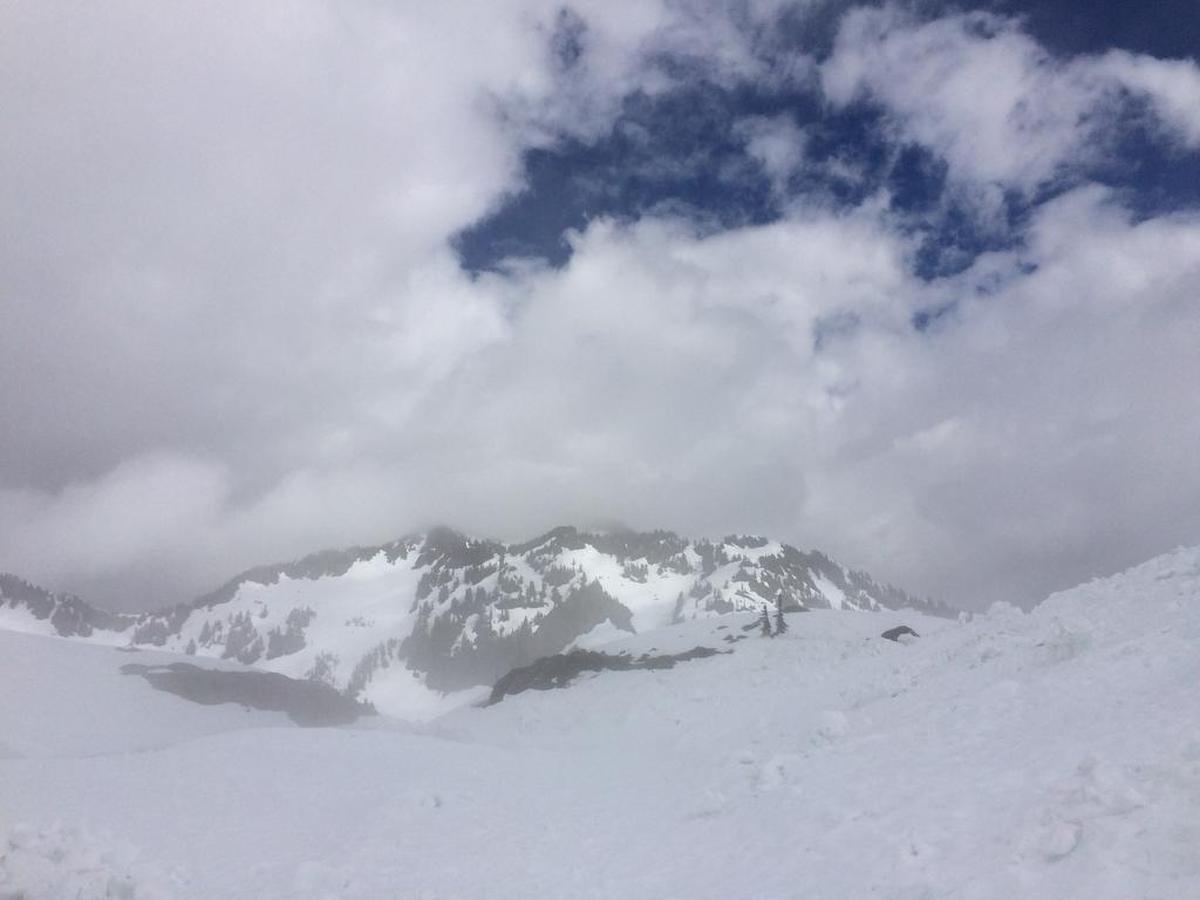 Snow is still deep in the parking lot at Artist Point as crews clear the last few miles of Mount Baker Highway. The final stretch of SR542 is expected to open June 29.