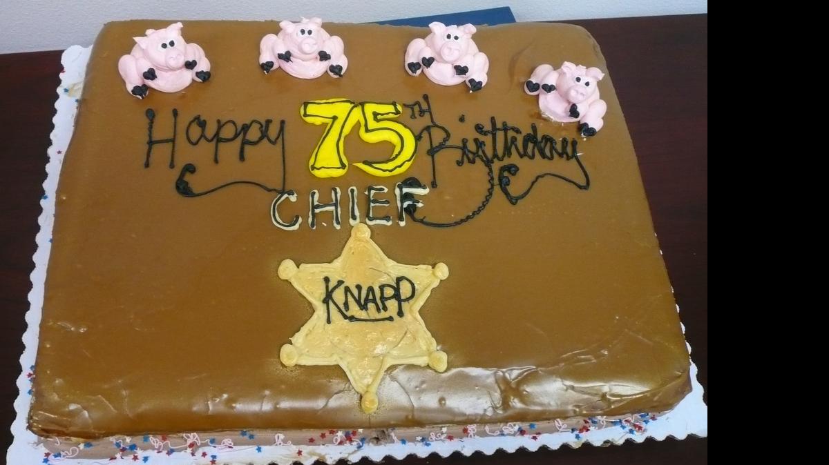 
Four little pigs and a badge decorate a 7-pound maple bar given to Ferndale Police Chief Michael Knapp on Monday, June 29, for his 75th birthday. Friend Bruce Mooney had the Ferndale Haggen make the special treat.
