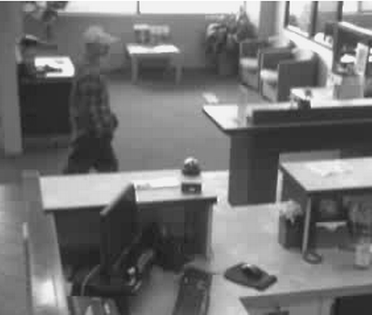 Police released this security camera photo of a man suspected of robbing the Washington Federal Bank in Ferndale in September. Police have arrested a Sumas man on Friday.
