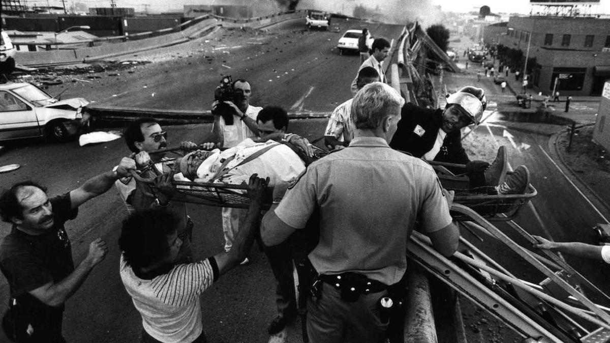 Rescuers evacuate a victim off the top deck of the Cypress freeway in Oakland, Calif., after a magnitude 6.9 earthquake Oct. 17, 1989. In June 2016, Northwest agencies will participate in a drill to test their response to a plausible 9.0 quake off the coast that could shake the ground for 5 minutes and spawn a tsunami.