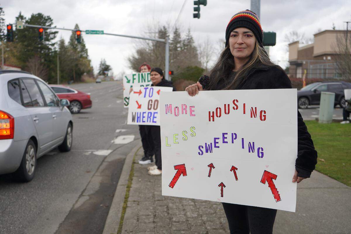 Lily Salas was one of about 15 people who gathered on March 9, 2024, to protest the impending clearing of the encampment behind Walmart in Bellingham, Wash.