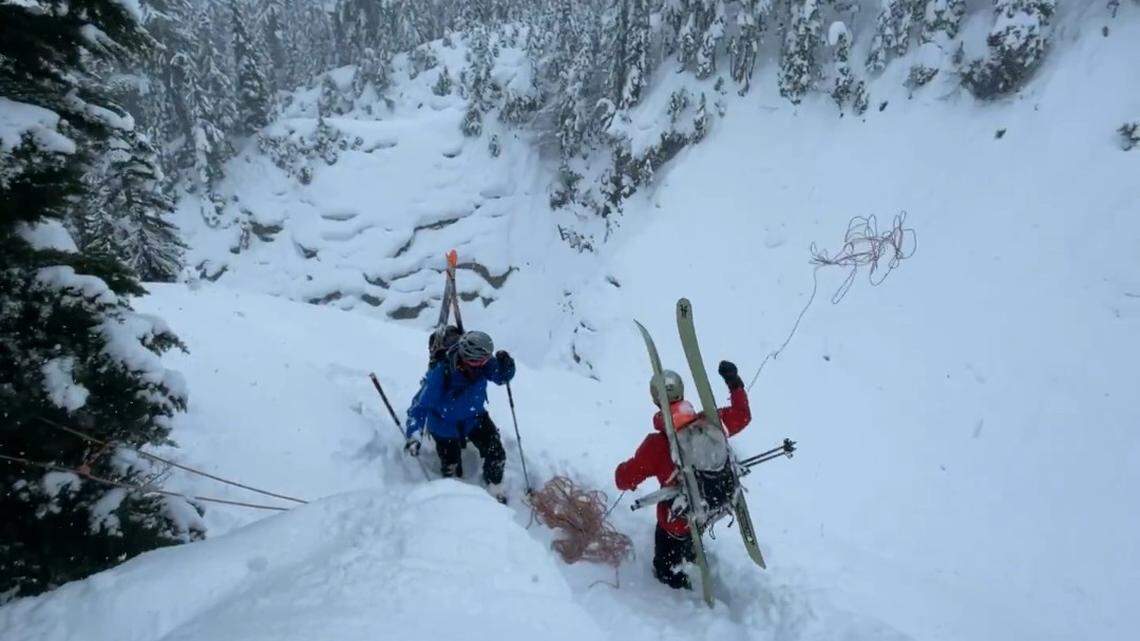 Search and Rescue volunteers with Bellingham Mountain Rescue crossed treacherous terrain to save missing snowboarder.