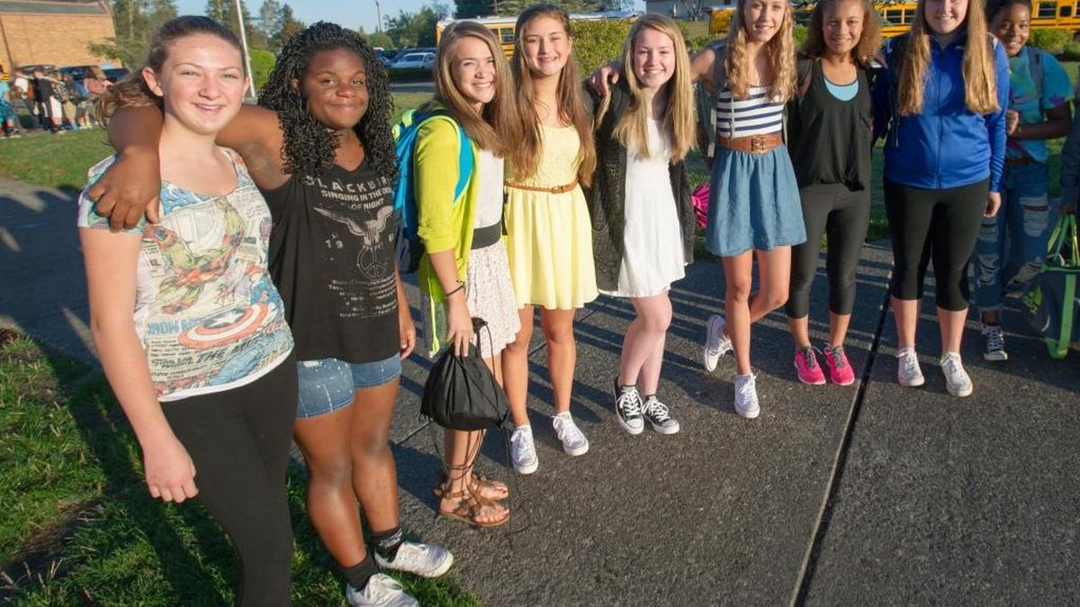 
Vista Middle School students wear dresses, shorts and leggings in a protest of the school dress code on Thursday, Sept. 10, 2015. Nathalia Bartosz, wearing the yellow dress in the middle, was forced to change clothes.
