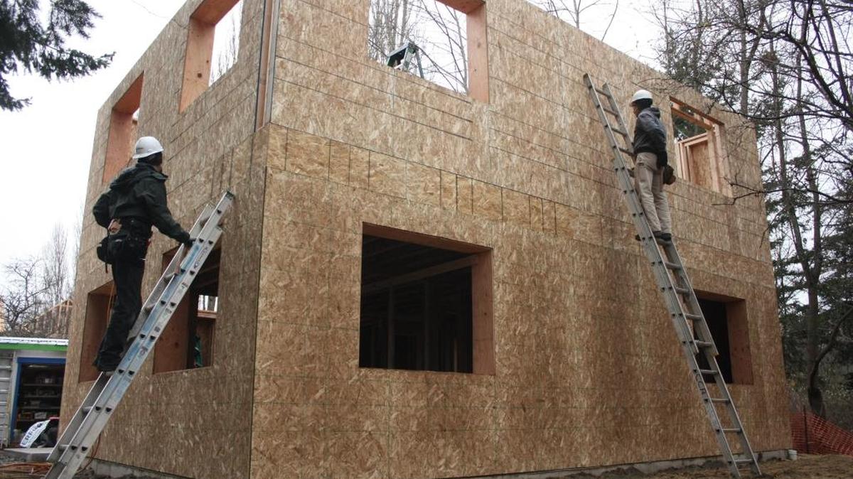 Habitat for Humanity of Whatcom County will pay its thrift store employees $15 an hour, what the organization considers a “living wage.” The wage requires more sales, which also results in more money to build houses like this Bellingham one that was under construction in December 2012.