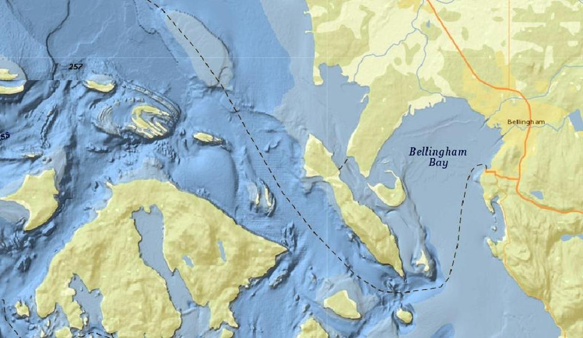 A lidar map of Bellingham Bay shows a faint scar where the Nooksack River delta empties and steep dropoffs around Lummi Island and other islands (the dotted line shows the Alaska ferry route).