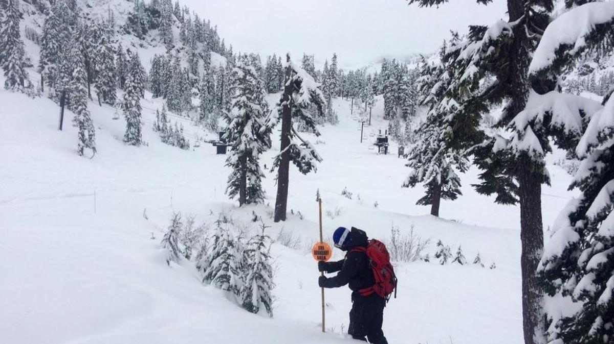 In this file photo, a member of Ski Patrol installs rope lines at Mt. Baker Ski Area.