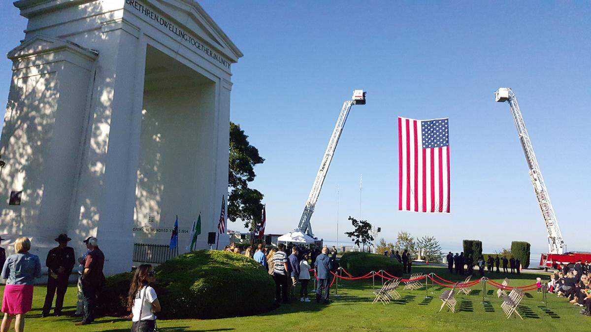 People gather Friday morning in Peace Arch State Park for an annual memorial for those who died in the Sept. 11, 2001, terror attacks and to honor local first responders.