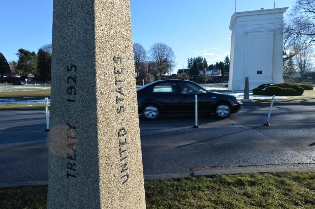 Canadian cars head to the U.S. at the Peace Arch border crossing in Blaine. A federal investigation uncovered a human smuggling network that may have helped nearly 1,000 Chinese migrants cross the Canada-U.S. border via the Peace Arch Park that straddles the border near Blaine.
