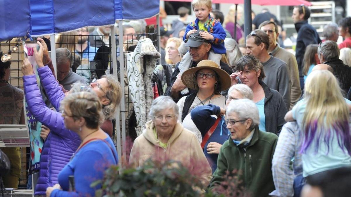 A crowd fills the plaza at the first Commercial Street Night Market in Bellingham on Sept. 4, 2015. The event was one of the winning ideas in the first Kapow Design Competition.