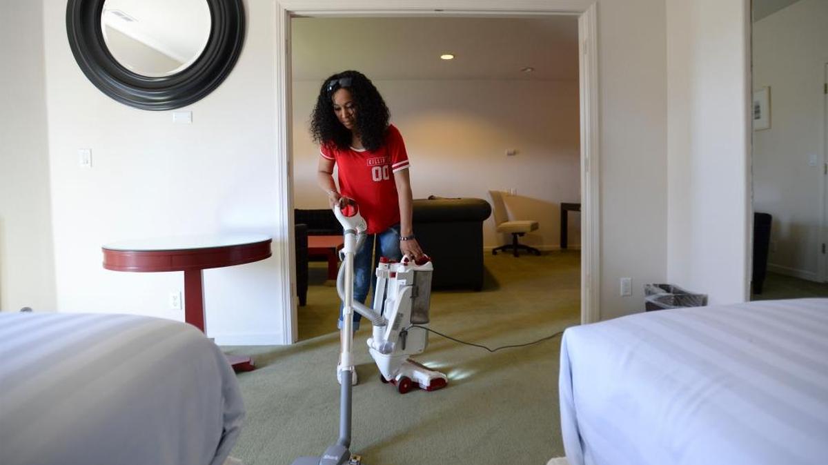 Tashena Jackson cleans a room at the Orca Inn Suites at 5370 Barrett Road in Ferndale on Tuesday, April 19, 2016. The 39-room extended stay hotel is planning to open soon.