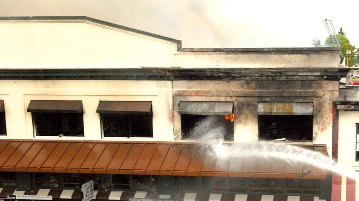 Firefighters battle a blaze at Delft Square, the historic Lynden Department Store building on Front Street, June 9, 2008.