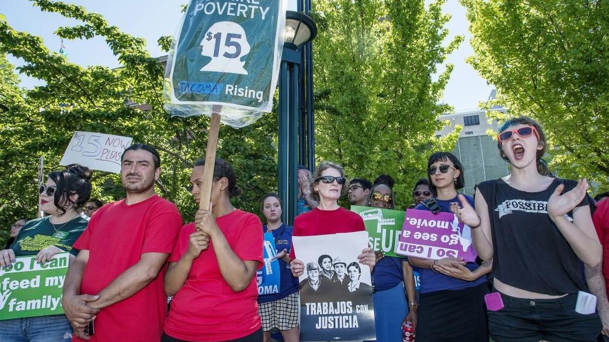 Members of 15 Now Tacoma joined Raise Up Tacoma, labor activists and union members June 30, 2015 for a Tacoma rally for a $15 minimum wage. Tacoma, Seattle and SeaTac will have minimum wages higher than the state’s $9.47 an hour in 2016. Whatcom County will continue to follow the state number.