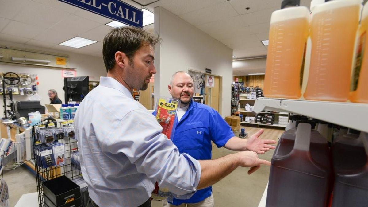 Customer Bill Havland, left, talks with LFS Marine store manager Jeff Wanlin at the store on Coho Way in Bellingham, Wednesday, Nov. 1, 2017. LFS is in negotiations to take up to 104,000 square feet in the former Georgia Pacific warehouse.