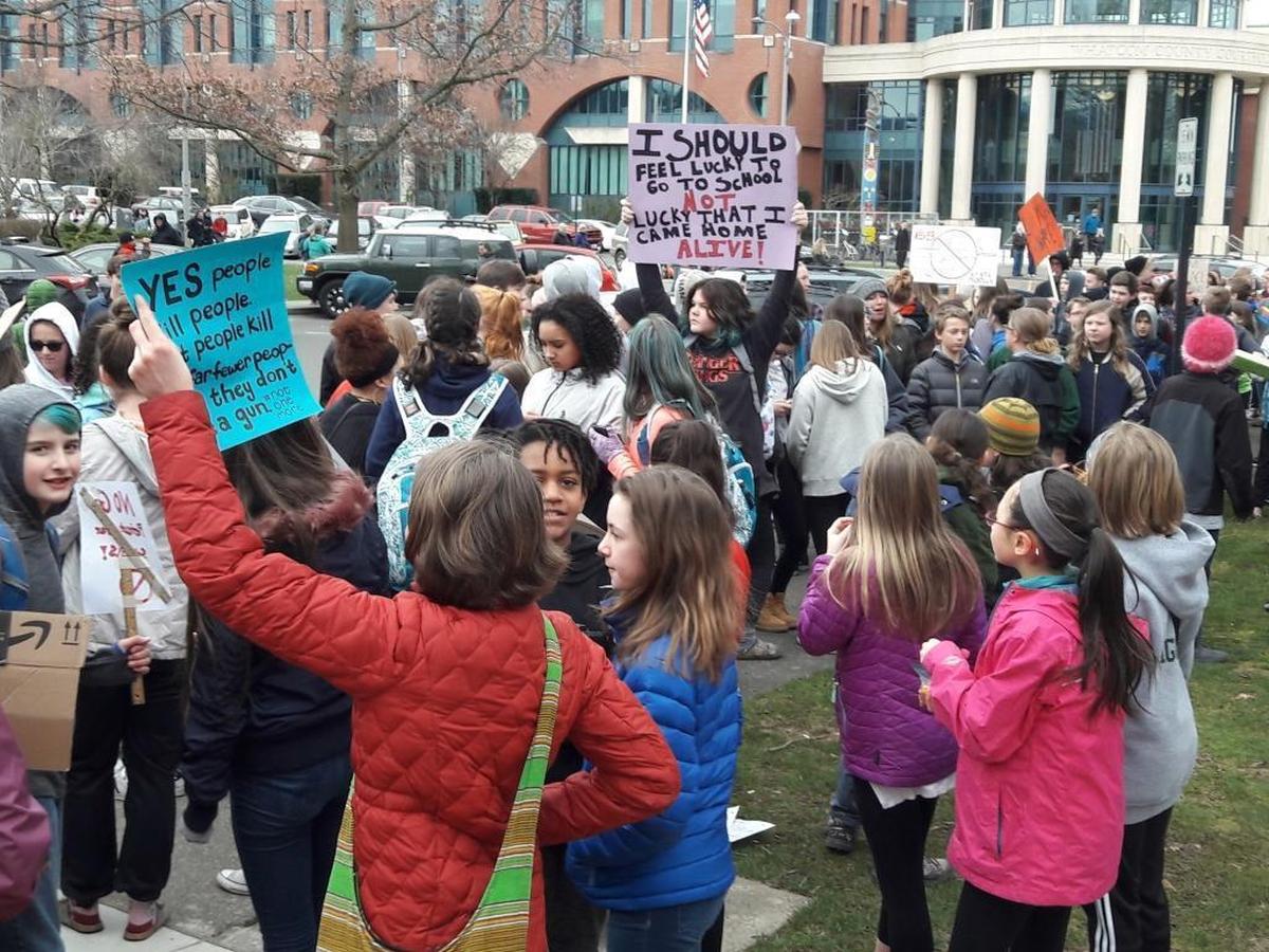 Middle school students from across Bellingham gather in front of City Hall on Wednesday, Feb. 21, 2018, to protest gun violence and promote school safety.