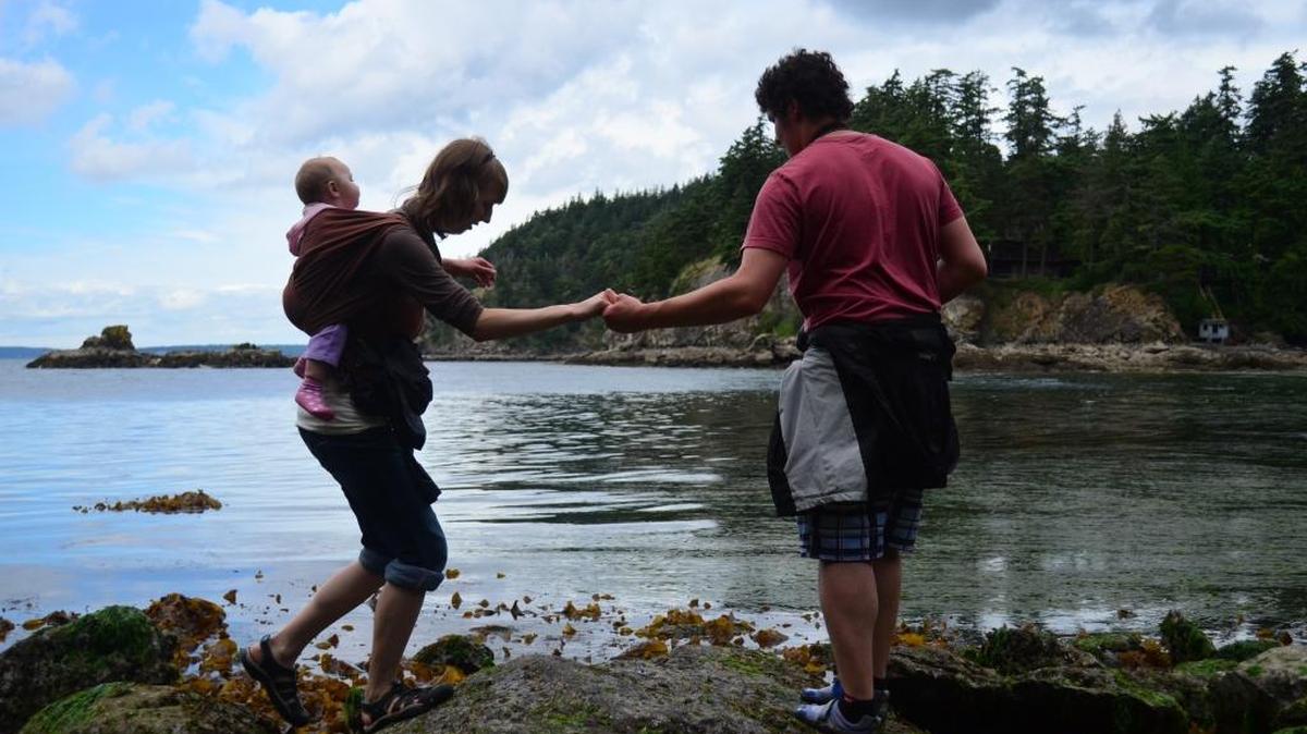 Lynden residents Anna and Matt van Voorst and their daughter Heidi investigate tide pools at Larrabee State Park in 2013. No Discover Pass is required at the park or other Washington state parks on March 19 and 26.