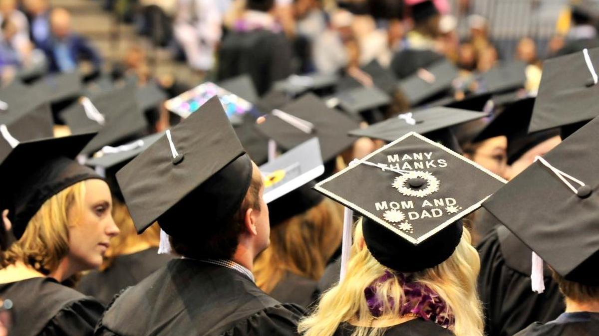 Graduating Western Washington University students are shown at ceremonies in Carver Gymnasium in June 2014.