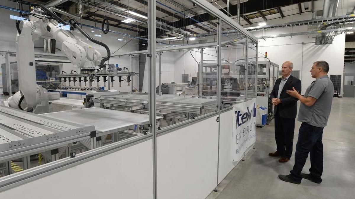 U.S. Rep. Rick Larsen tours Itek Energy's new solar panel manufacturing facility on Cornwall Avenue with Chief Operating Officer Dave McCarty in Bellingham Friday, Oct. 6, 2017. The manufacturing industry in Whatcom County has added 800 people in the past year, while construction added 400, according to recent data from Washington State Employment Security Department.