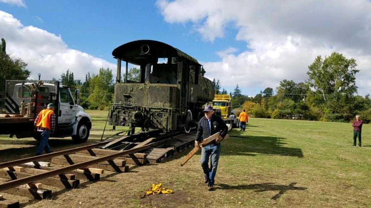 Crews work to remove an antique steam locomotive from Bloedel Donovan Park in Bellingham on Thursday, Sept. 21, 2017. The 1918 vintage steam locomotive is being moved to the Northwest Railway Museum in Snoqualmie.