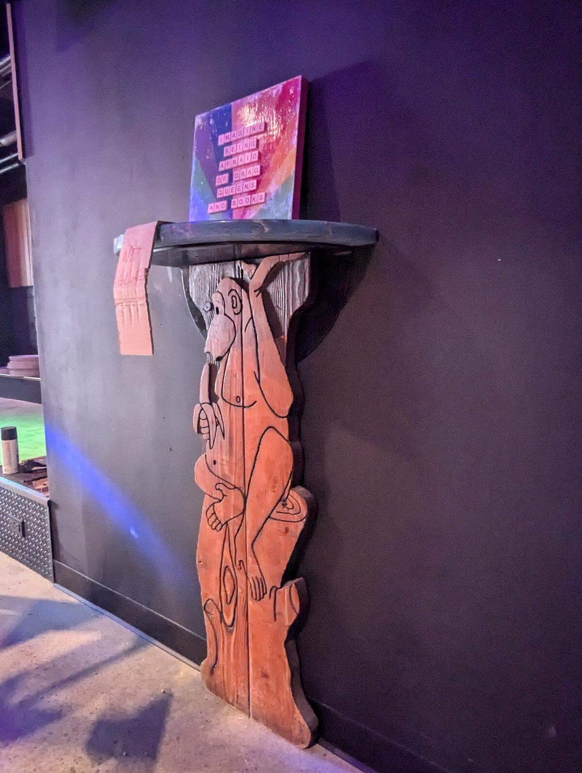 The monkey wood carving was originally part of a booth in Rumors Cabaret. Although owner Rian Greer hasn’t been able to confirm it officially, the booth was rumored to be at the Stonewall Riots of 1969 in New York, according to local folklore.