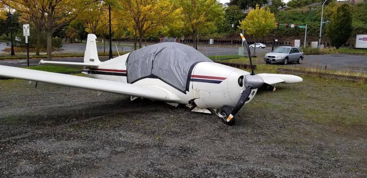 A single-engine airplane that made an emergency landing in Bellingham Bay off Locust Beach on Thursday has been pulled out of the water. It sits near Redden Marine Supply on Roeder Avenue on Friday, Oct. 6, 2017.