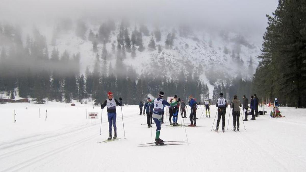 In this photo taken Jan. 25, 2015, cross-country skiers warm up before a race in Mazama in the Methow Valley. A lack of snow last winter season caused some cross-country centers to close until more snow arrived, prompting many avid skiers to hit the road, including to Mazama.