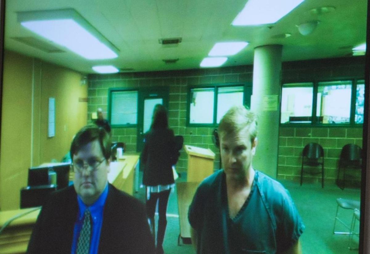David John Schneider, right, makes his first appearance in Whatcom County Superior Court with his attorney David Kennedy in 2017. Schneider was sentenced Monday to 364 days in the Whatcom County Jail with 334 suspended for one count of second-degree voyeurism (domestic violence), a gross misdemeanor.