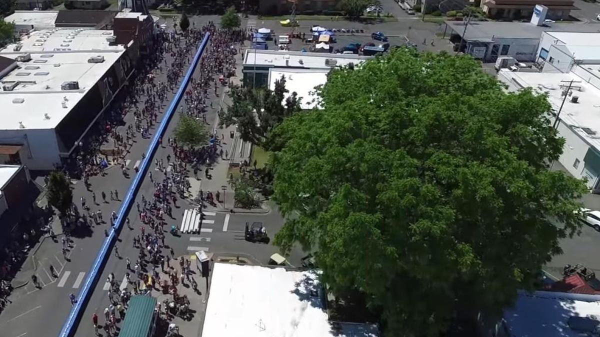 A screengrab from a drone video of the 1,250-foot strawberry shortcake created Saturday, June 4 in Lynden, Wash.