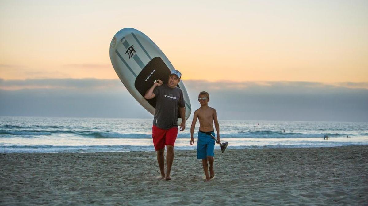 Stephan Aarstol of Tower Paddle Boards and his son, Alex. Aarstol’s company is scheduled to be in an ABC ‘20/20’ episode about ‘Shark Tank’ success stories.