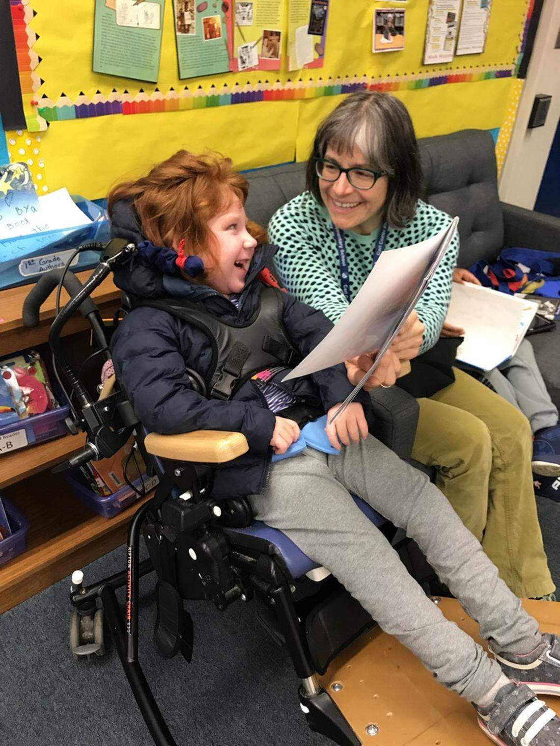The Washington Legislature is considering pay increases for paraeducators statewide. Life skills paraeducator Libby Chenault is shown here during the 2018-19 school year at Carl Cozier Elementary School in Bellingham.