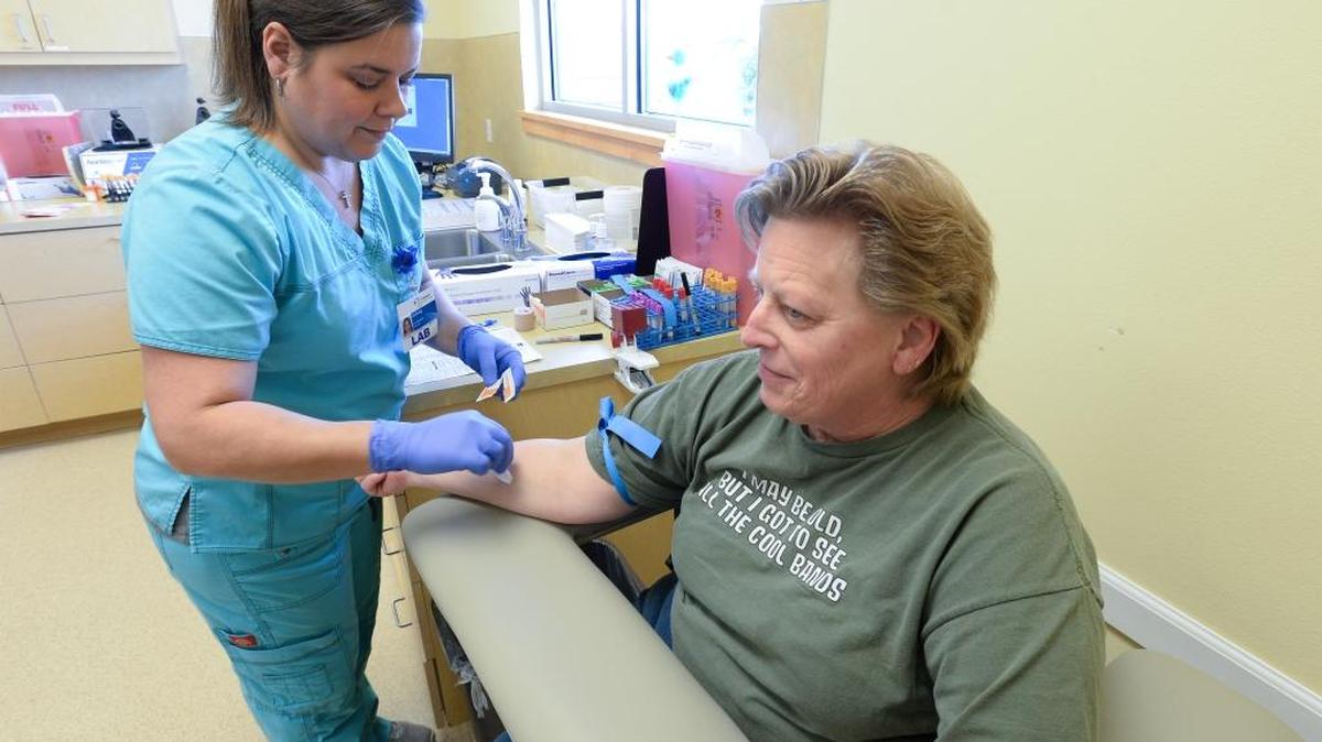 Family Care Network lab assistant Solveig Johnson takes a blood sample from Lesley Cooke at Ferndale Family Medical Center on Thursday, March 16, 2017. The center is part of Family Care Network, which is adding lab services by creating a dedicated space at Ferndale Family Medical Center to process specimens and putting a blood draw station, with a phlebotomist, into most of its clinics in Whatcom and Skagit counties.