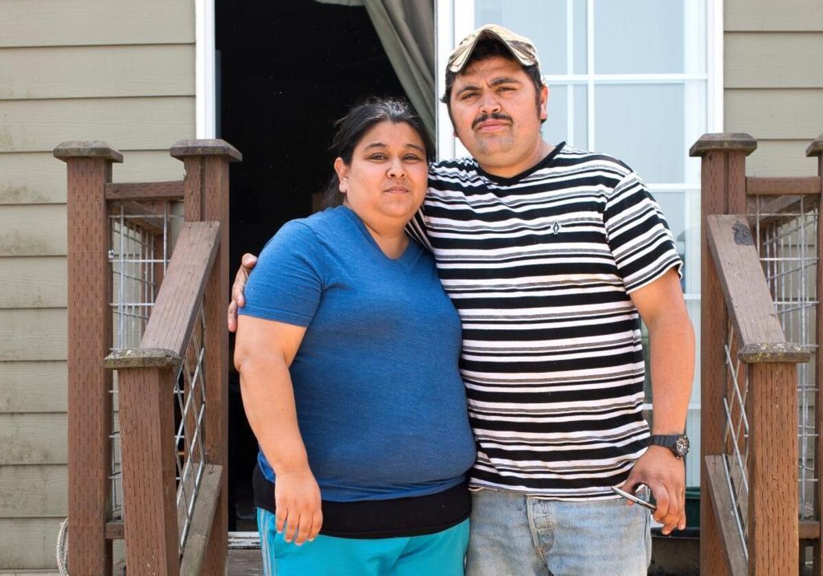 Lucia Suarez, left, and Joaquin Suarez own the home where the fired farmworkers are currently camping on Friday, Aug. 11, near Sumas.