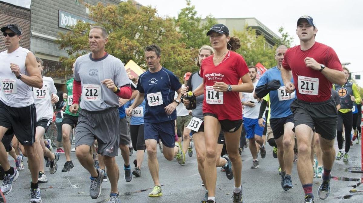 Runners take off from the start of the Bellingham Traverse race on Saturday, Sept. 19, 2016 in Bellingham, Wash.