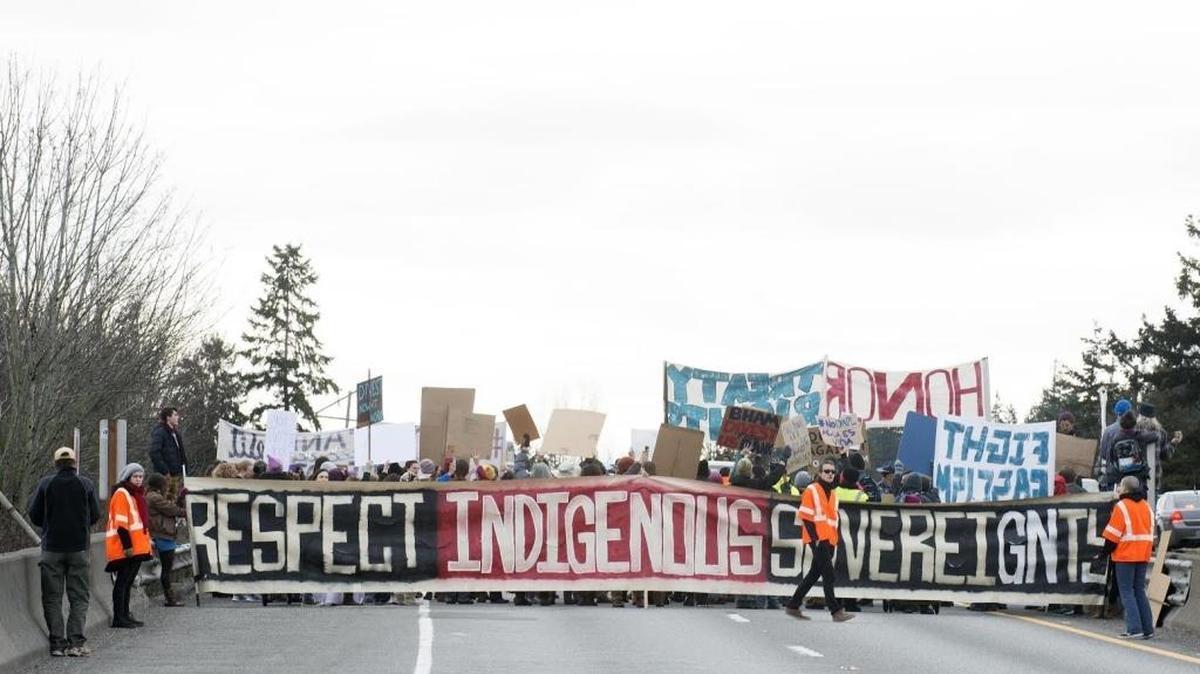 Protesters block northbound Interstate 5 near Lakeway Drive in protest of the Dakota Access Pipeline on Saturday, Feb. 11, in Bellingham, Wash.