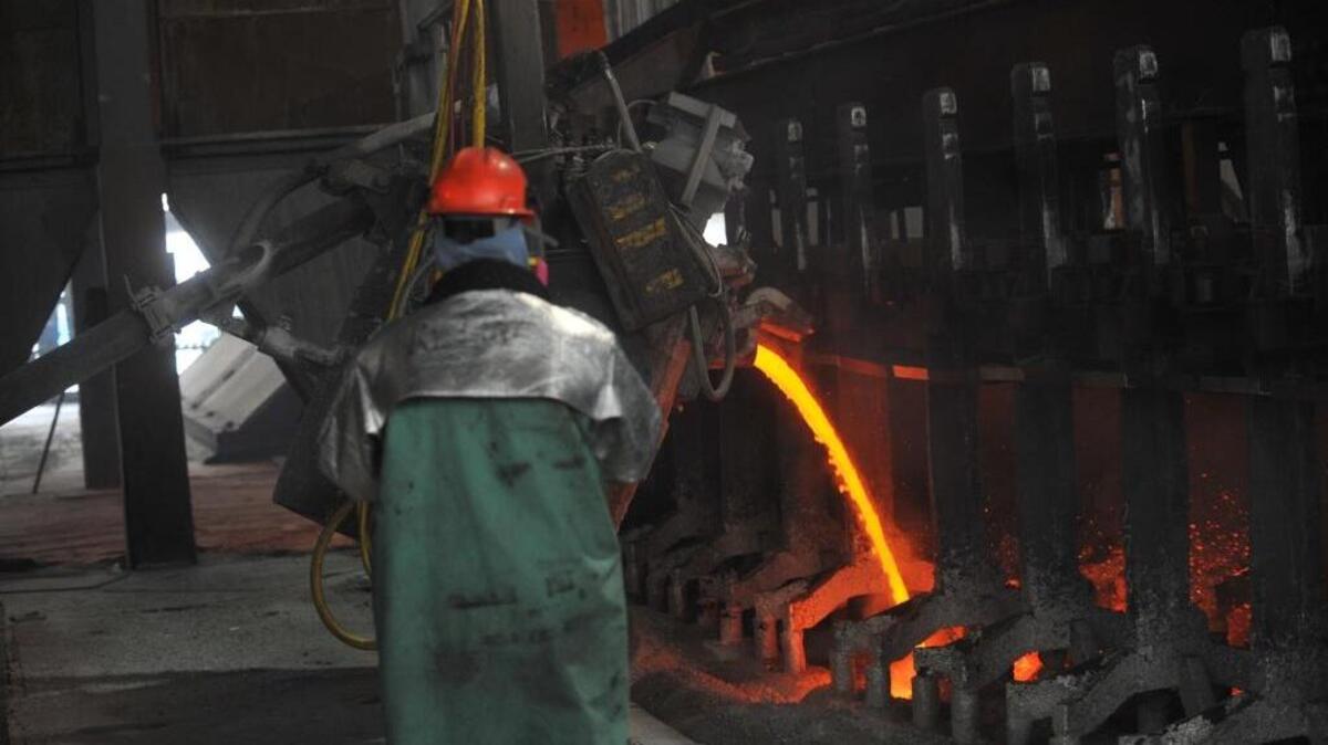Workers start aluminum smelter pots on potline B at the Alcoa Intalco aluminum smelter west of Ferndale on Feb. 15, 2011. The U.S. International Trade Commission says it will investigate possible aluminum market manipulation after plummeting prices have hammered the industry.