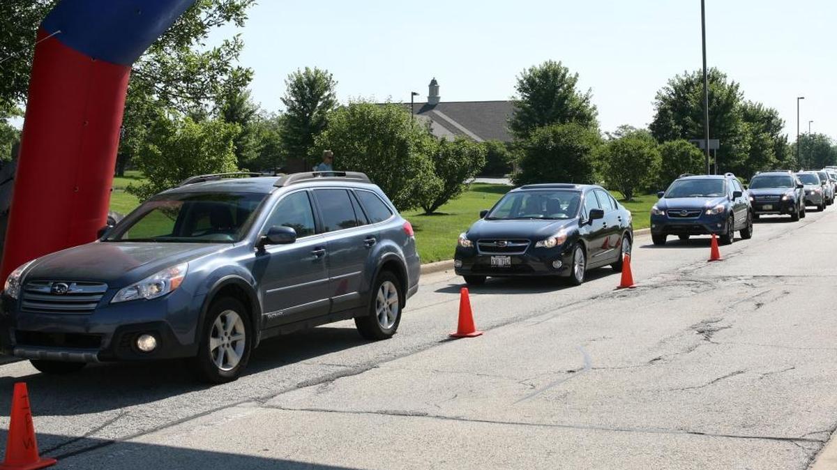 A parade of Subarus lines up in Itasca, Ill., on July 24, 2013 to set a then-world record of nearly 400 Subaru cars. A group of enthusiasts in Russia hold the current record of 549 cars, which Dewey Griffin Subaru of Bellingham is hoping to break Sunday, June 5 in Birch Bay .
