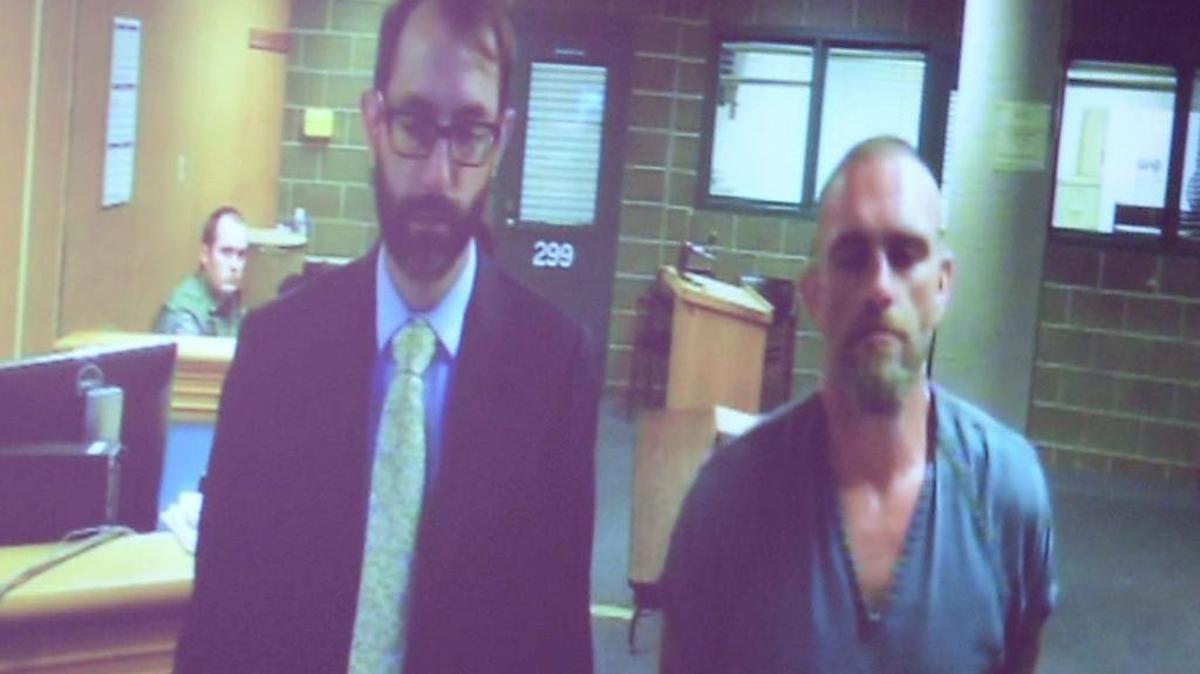Deputy Public Defender Richard Larson, left, appears with defendant Lance Rosa in Whatcom Superior Court in Bellingham, Monday, June 20, 2016.
