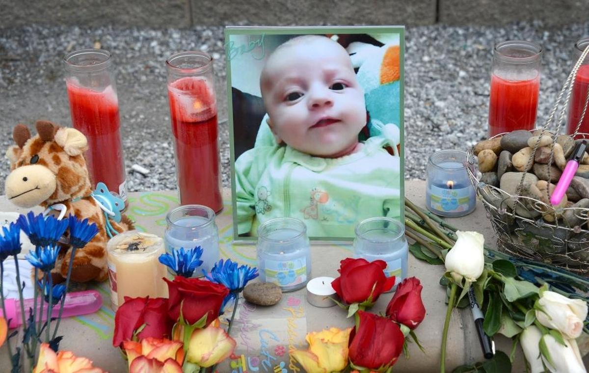 A memorial in Maritime Heritage Park Feb. 24, 2016, for Lucian Mykael Shields, who died in December at age 3 months. Lucian’s parents are charged with manslaughter for his death
