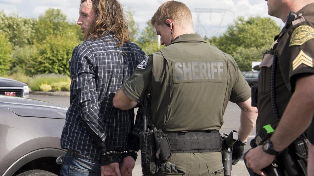 Police arrest Marshall Lee May on Friday, June 10, 2016. May is a suspect in a car-stealing spree through Bellingham, for which he has offered no explanation.