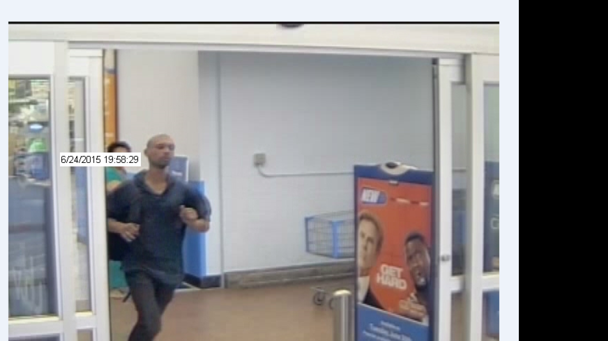 
Bellingham police are asking for help identifying this man caught on surveillance footage as he allegedly stole two Samsung Galaxy tablets from Walmart and threatened to shoot an employee Wednesday night, June 24. 

